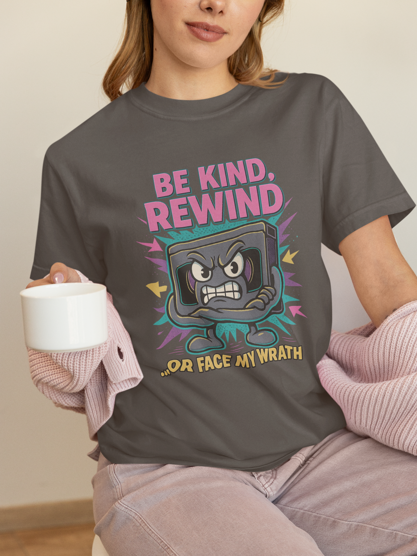 Retro Be Kind Rewind VHS T-Shirt with neon cartoon VHS tape graphic"