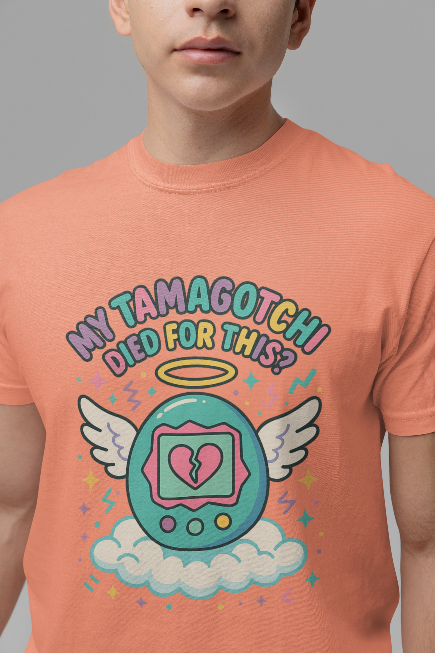 Retro My Tamagotchi Died T-Shirt with pixelated digital pet and broken heart graphic
