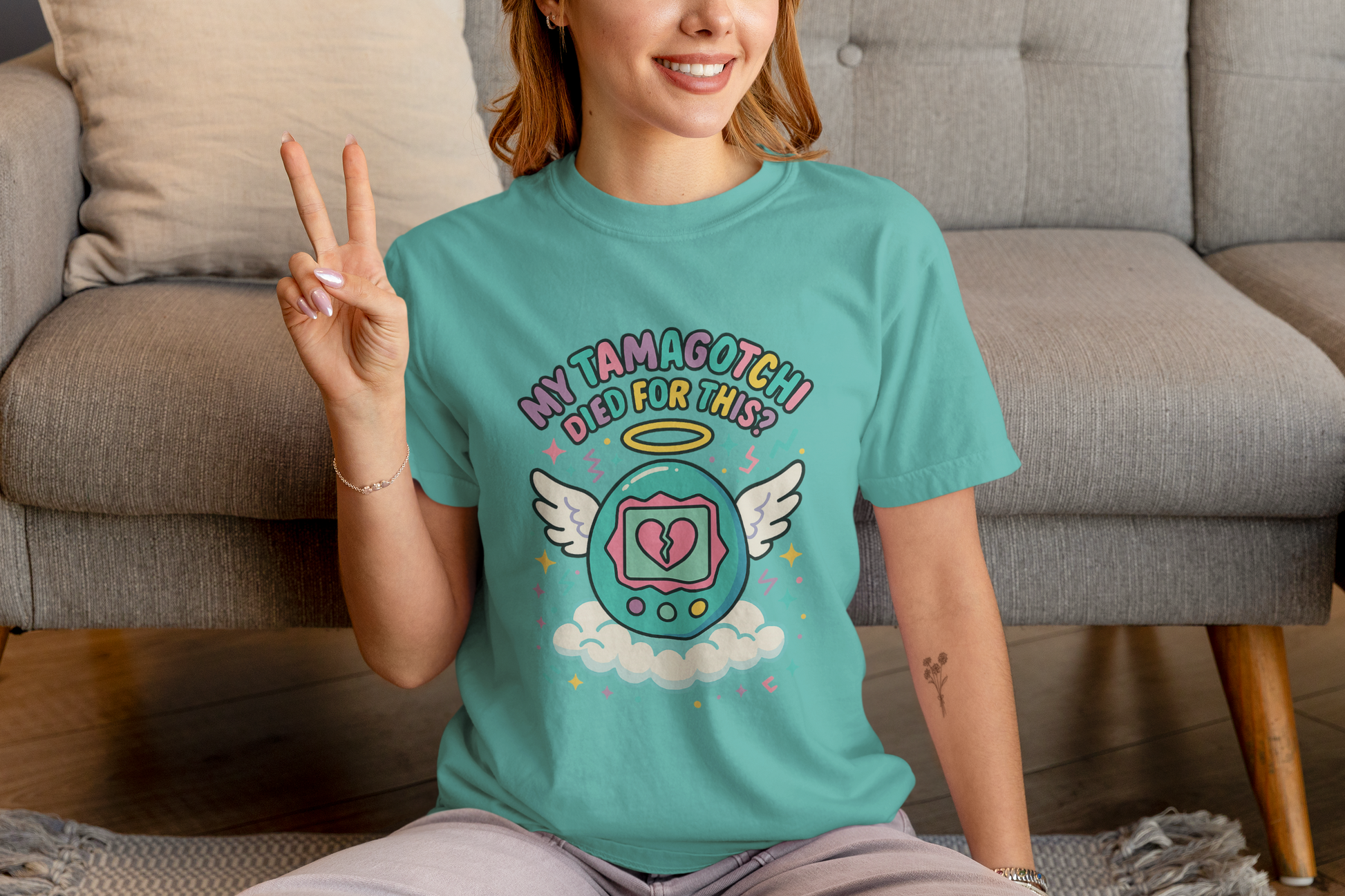 Retro My Tamagotchi Died T-Shirt with pixelated digital pet and broken heart graphic